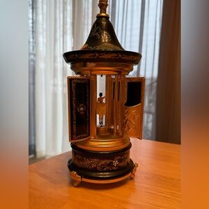 Vintage Rugue musical carousel lipstick holder